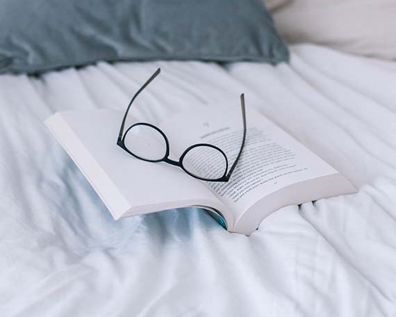 Glasses on Open Book