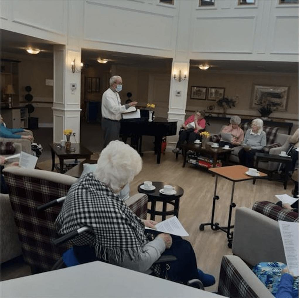 residents watching an entertainer