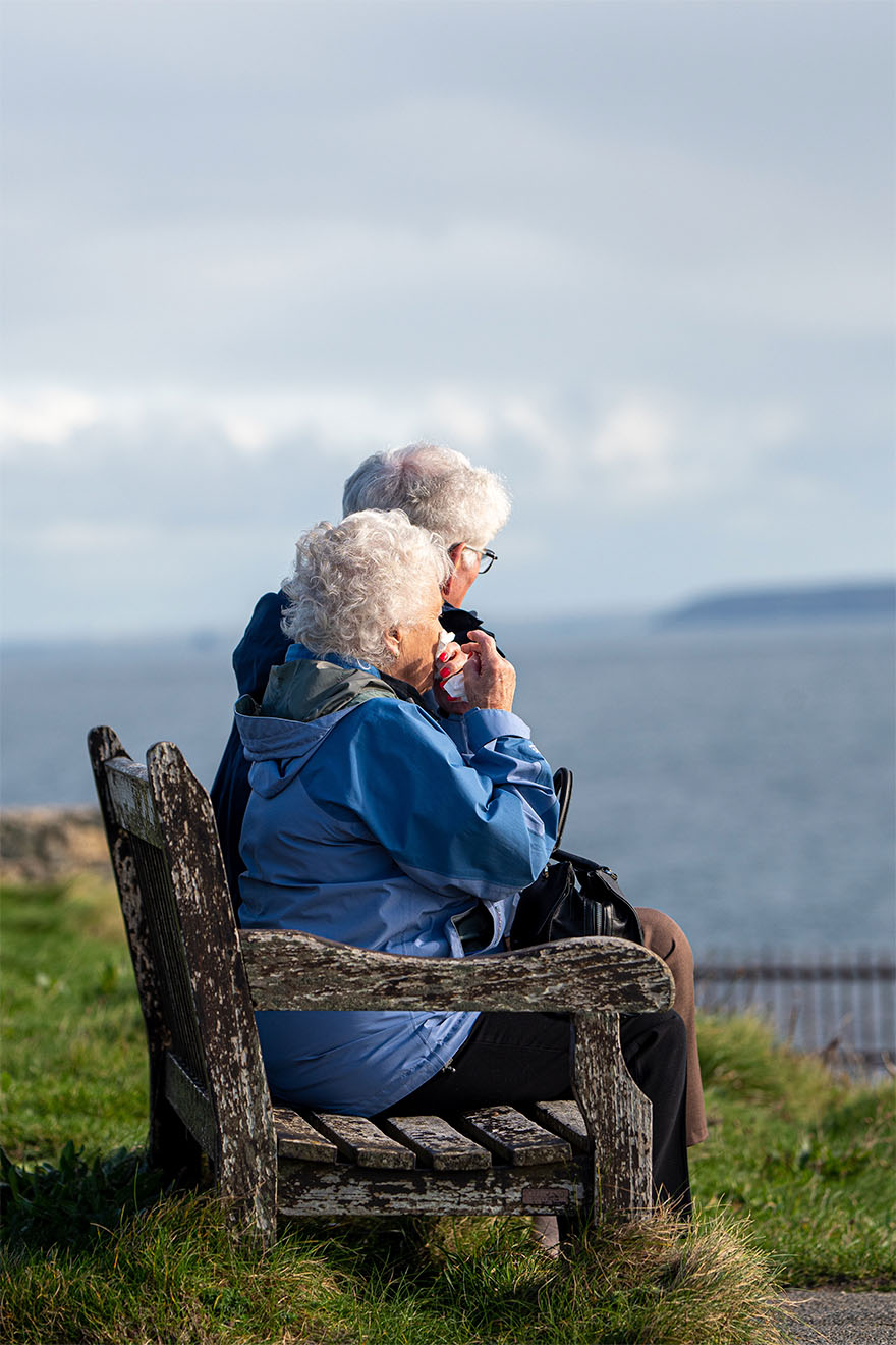 residents sat on a bench together