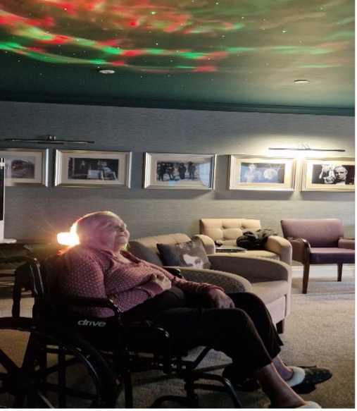 one of our residents sat in the sensory room